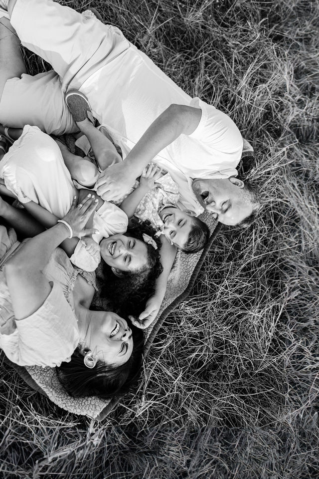 family of four black and white image at Crestwood park in Royal Palm Beach FL
Little Ones Laughing During a Family Session